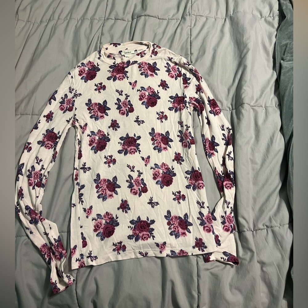 Vintage look printed mock neck shirt.
